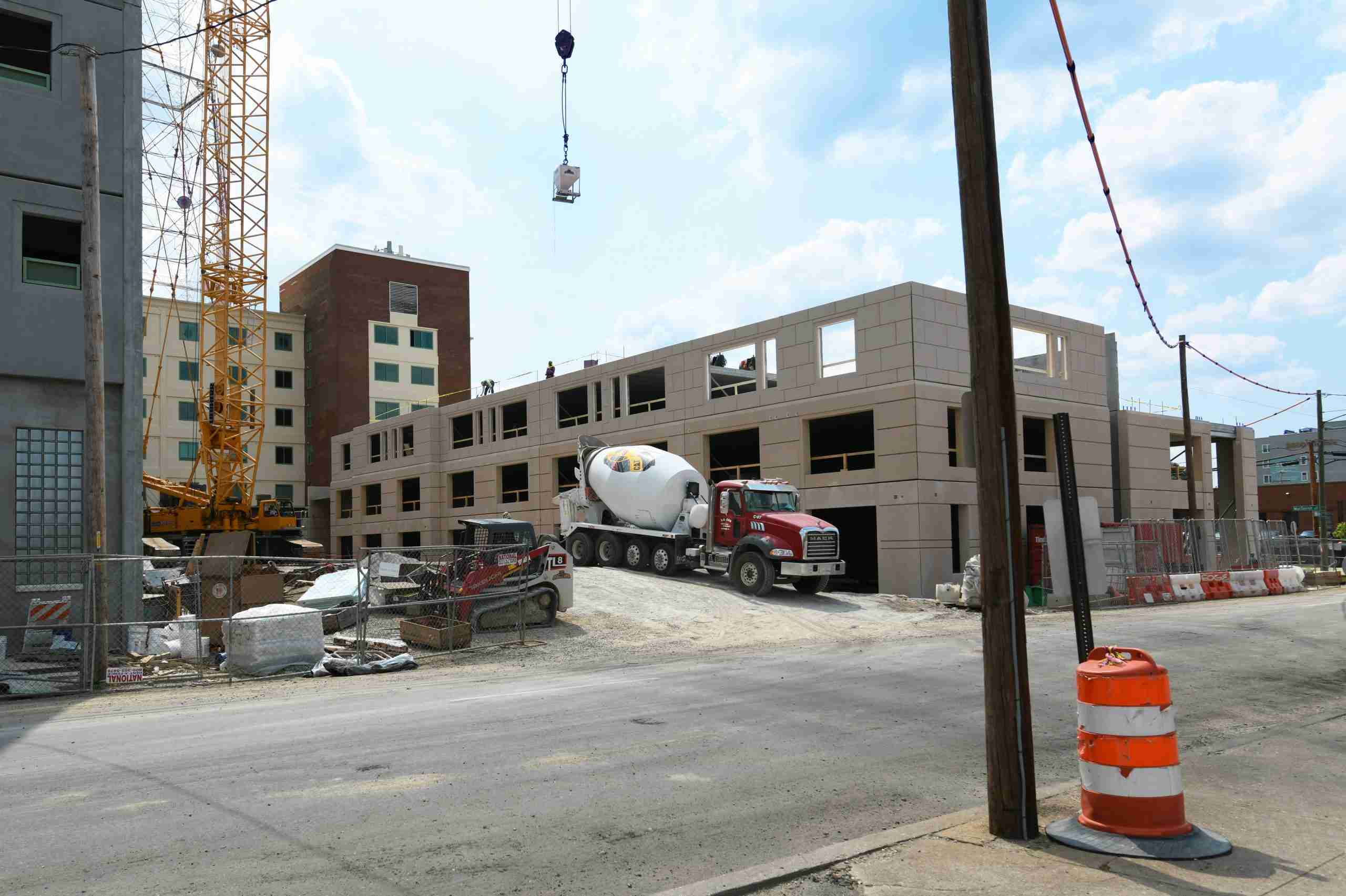 Lifting concrete onto building